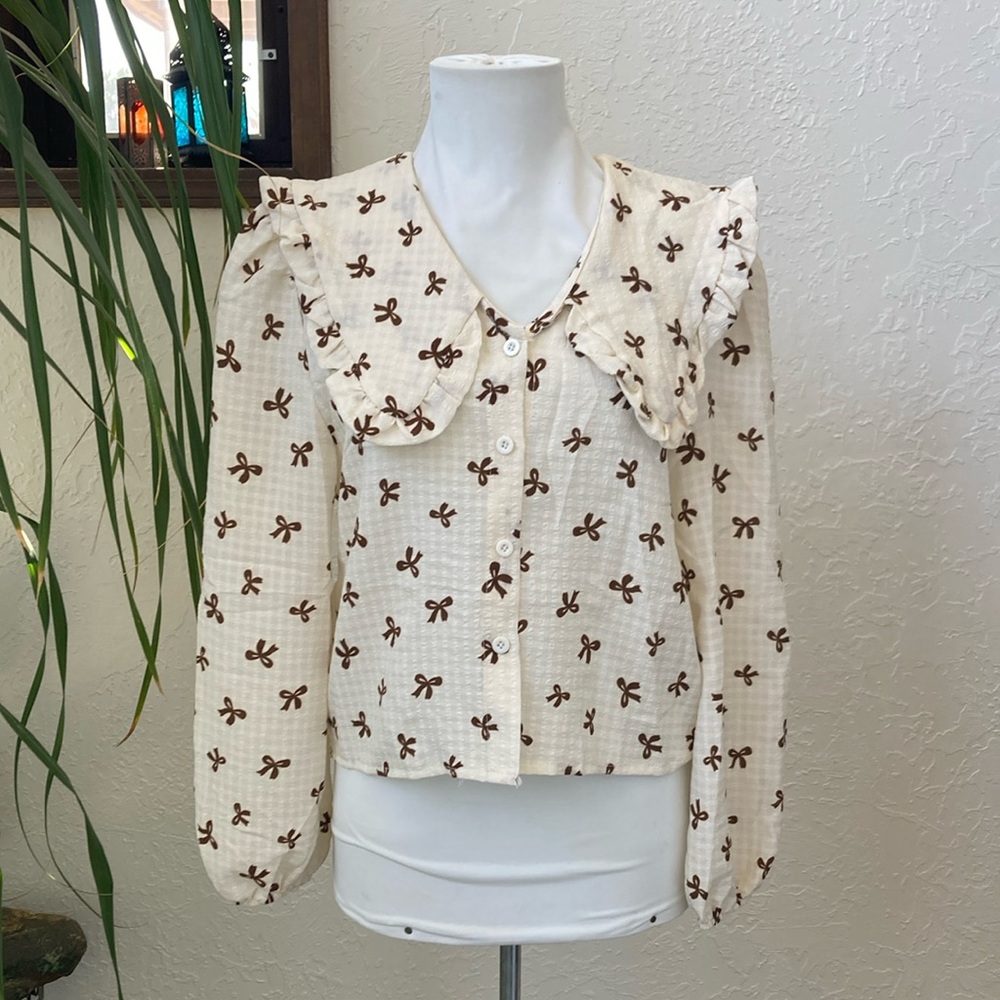 Cider Cream and Brown Bow Print Cropped Ruffled Puff Sleeve Blouse